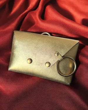 Golden women's belt bag for the waist