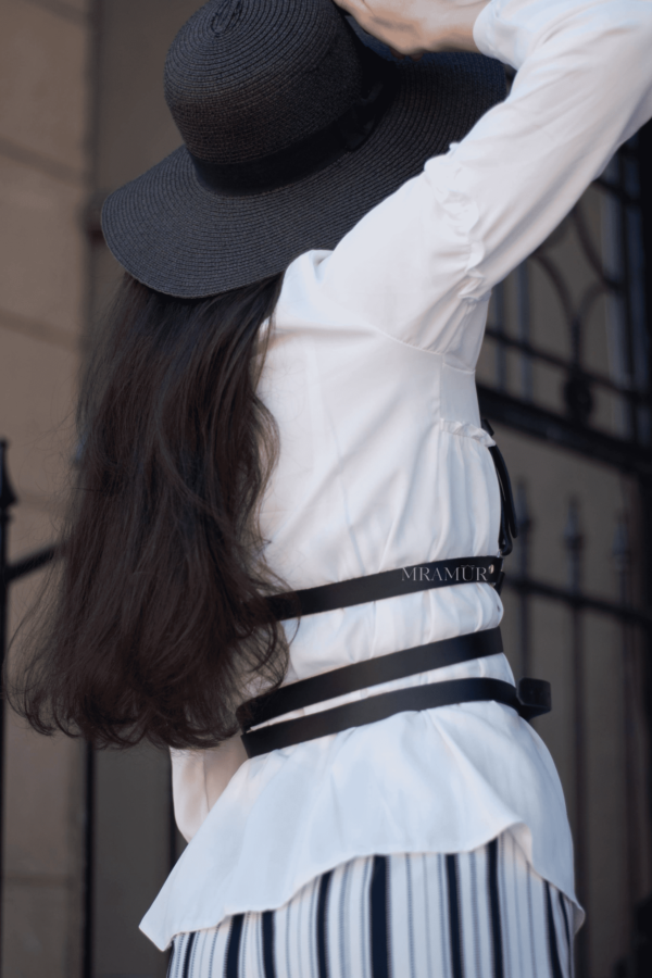 back of the women harness with a long belt