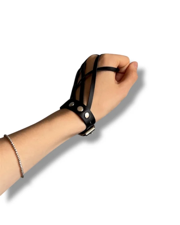 leather wrist cuffs with hand detailing